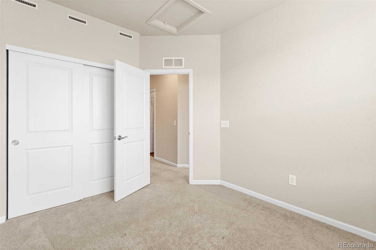 8417 Rizza Street, Unit A Littleton, CO 80129 - Photo 16 of 30 a view of an empty room