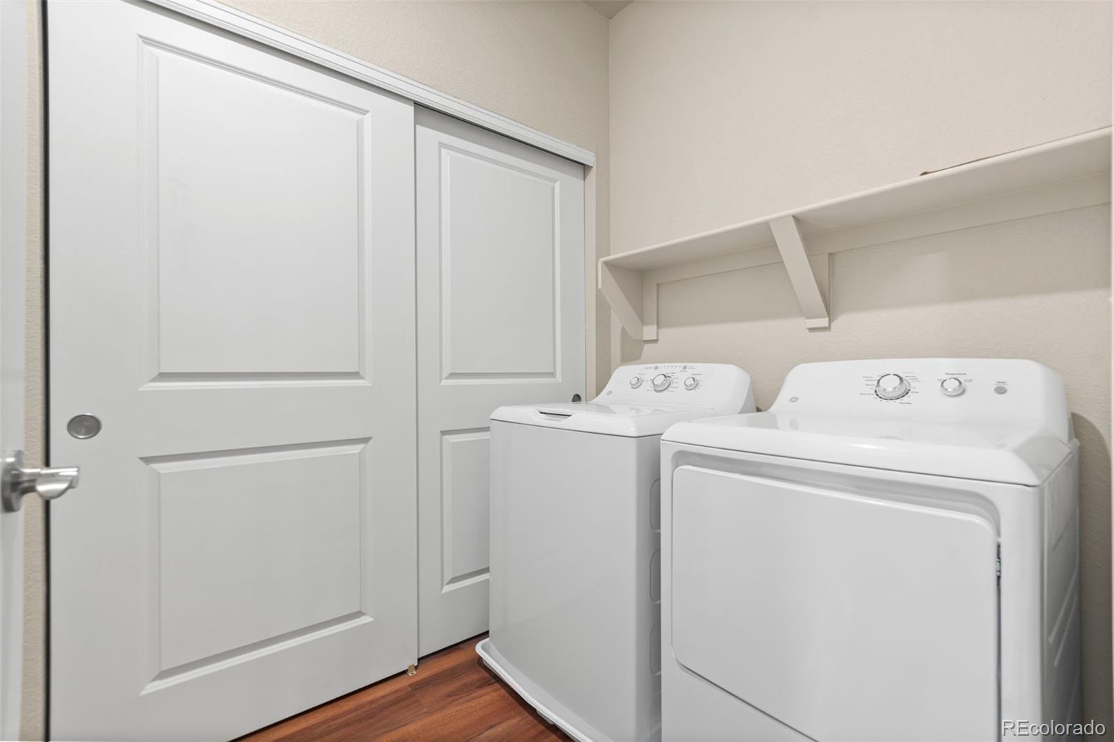 8417 Rizza Street, Unit A Littleton, CO 80129 - Photo 17 of 30 a utility room with dryer and washer