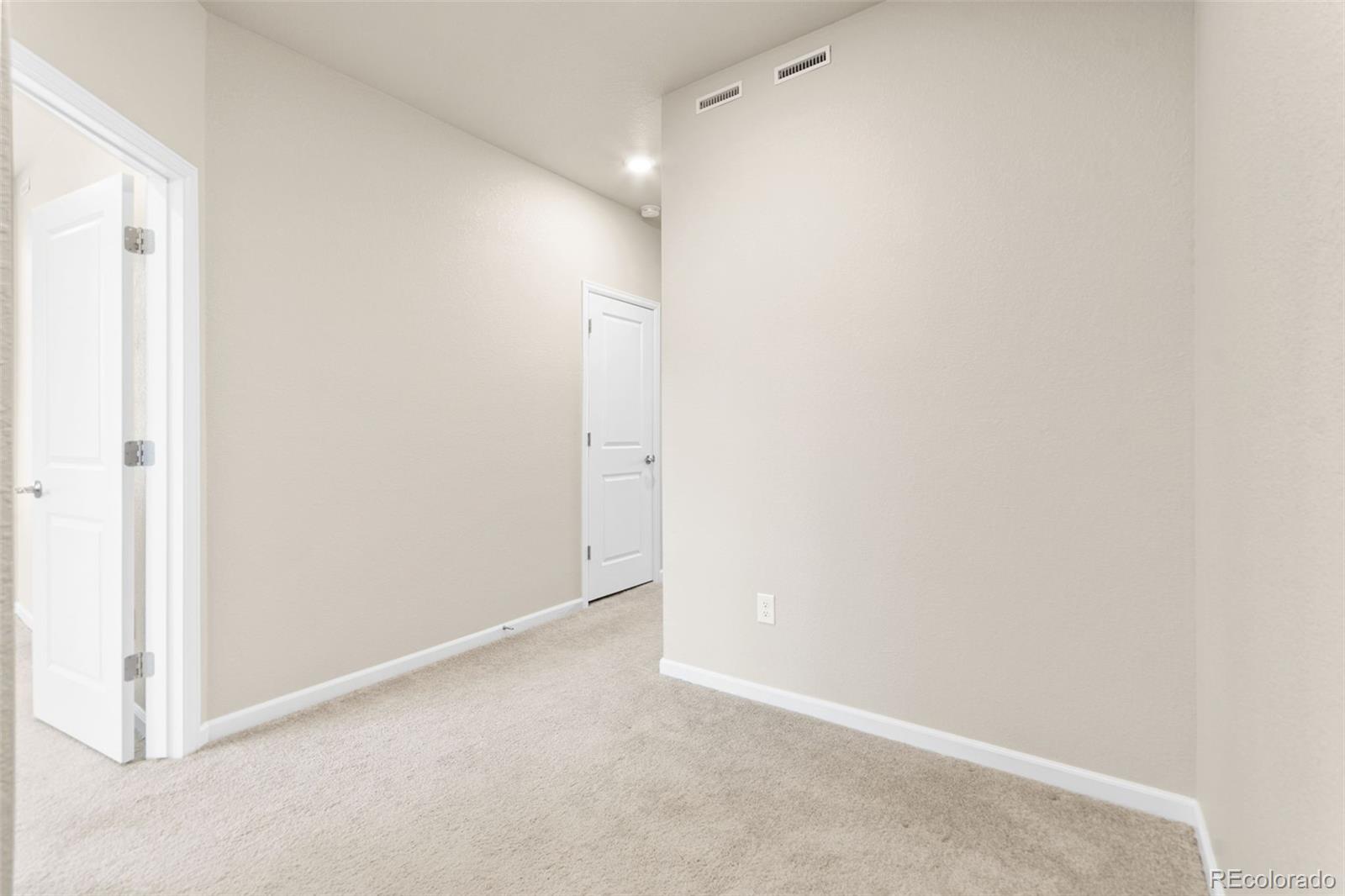 8417 Rizza Street, Unit A Littleton, CO 80129 - Photo 30 of 30 a view of an empty room