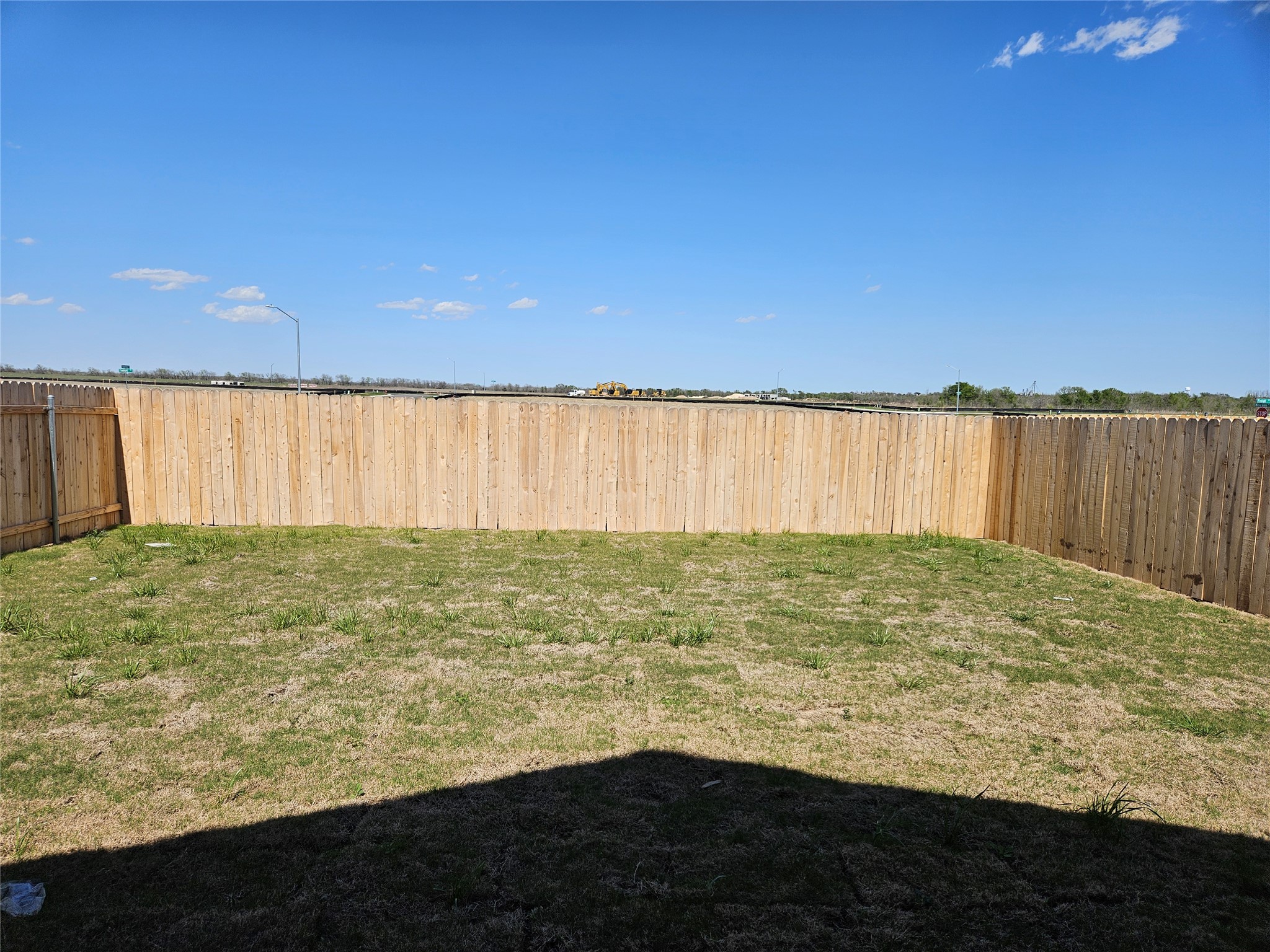 23604 Tiny Moons Way Elgin, TX 78621 - Photo 22 of 25 View of yard featuring a fenced backyard