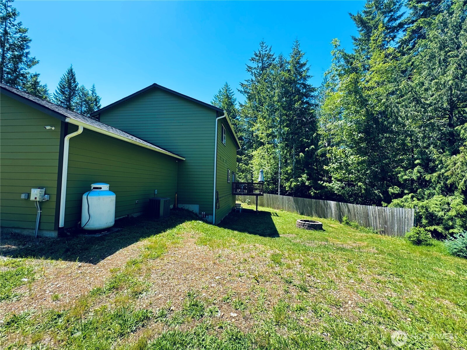 401 East Sunset Ridge Road Union, WA 98592 - Photo 36 of 37 a view of a backyard with a small pool