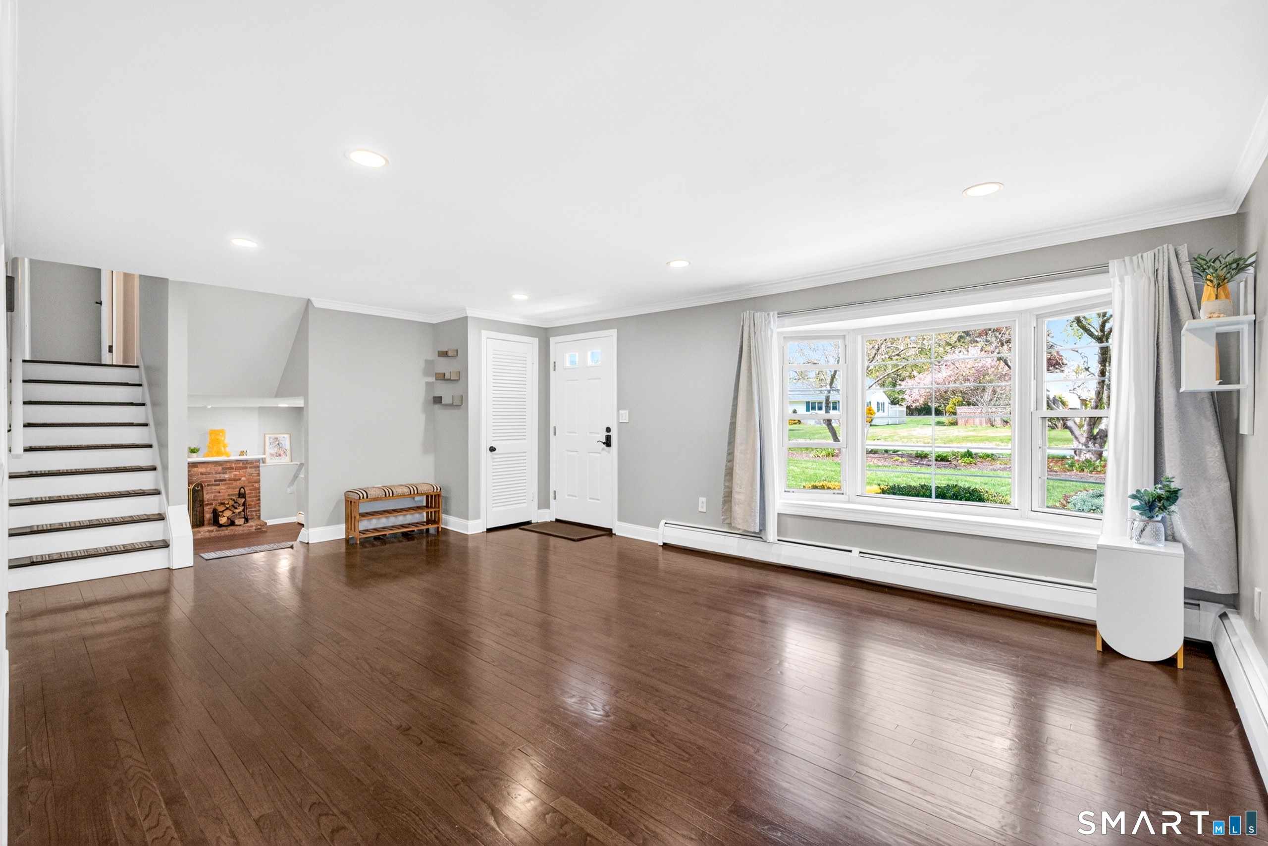 568 Wiese Road Cheshire, CT 06410 - Photo 9 of 40 a view of empty room with wooden floor and window
