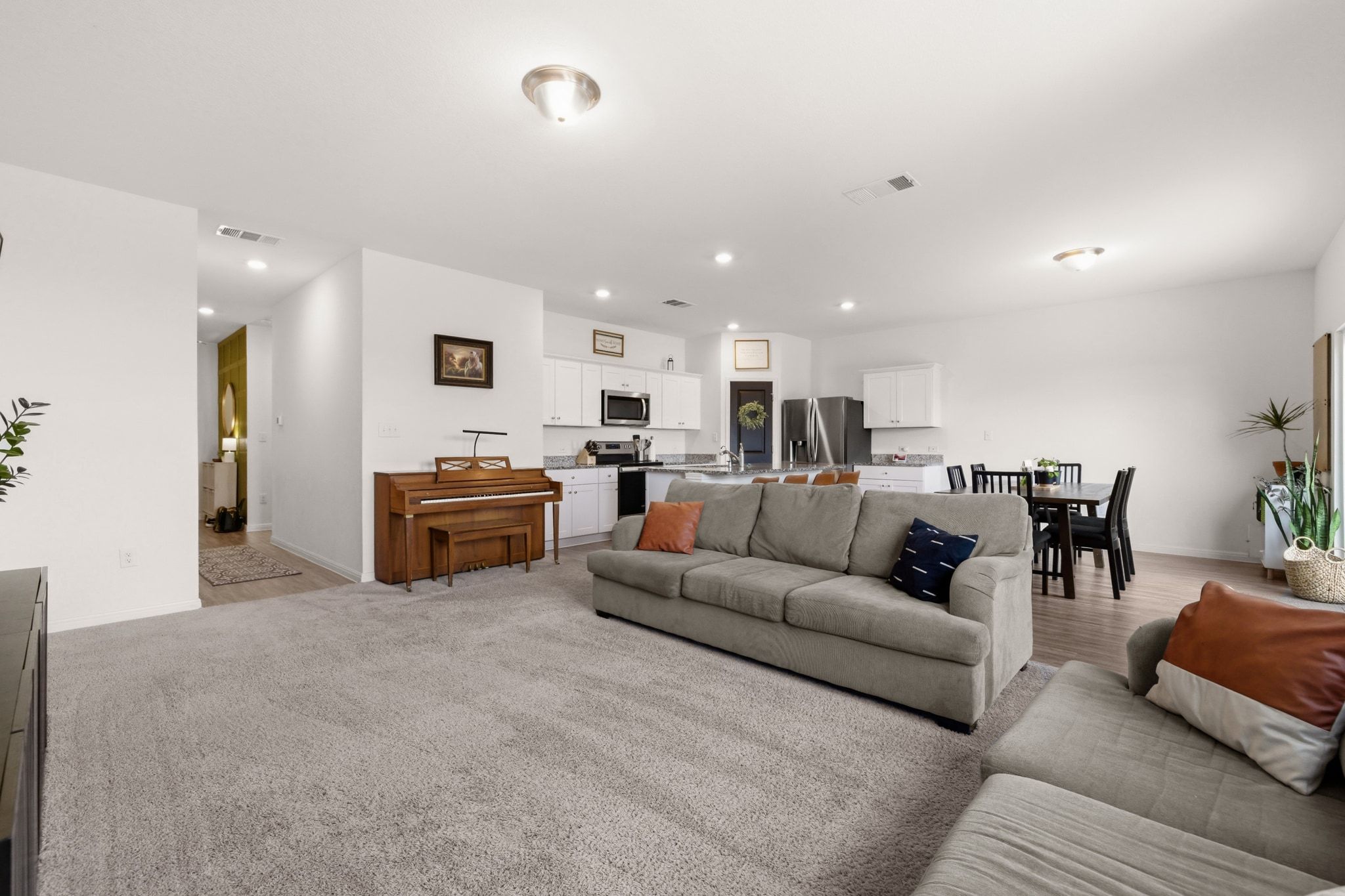 212 Wonderful Life Way Jarrell, TX 76537 - Photo 8 of 25 Living area with baseboards and recessed lighting
