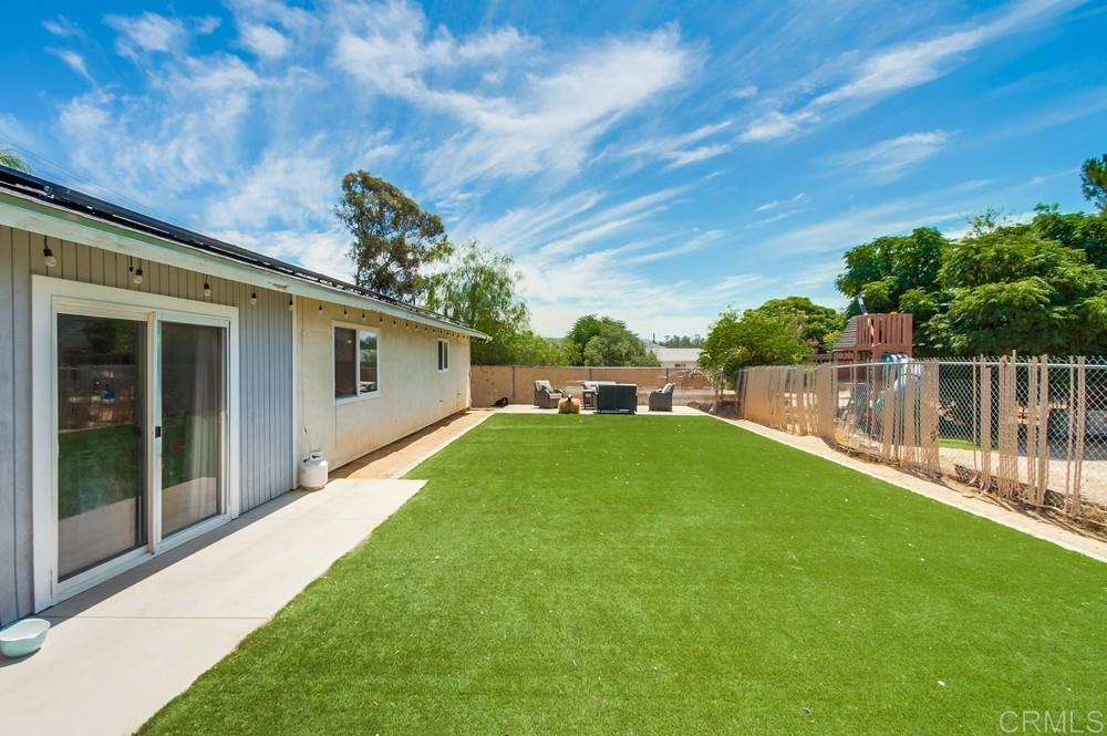415 3rd Street Ramona, CA 92065 - Photo 29 of 33 a view of a backyard with plants and a patio