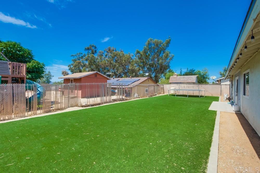 415 3rd Street Ramona, CA 92065 - Photo 30 of 33 a view of a house with a backyard