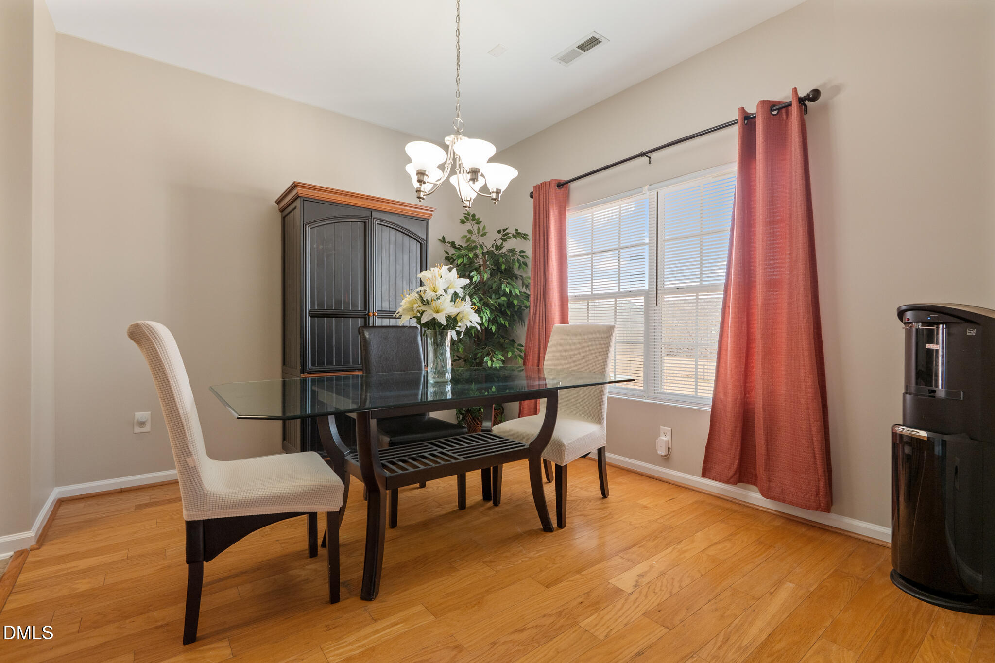 2019 Tennessee Road Durham, NC 27704 - Photo 10 of 28 a dining room with furniture a chandelier and wooden floor