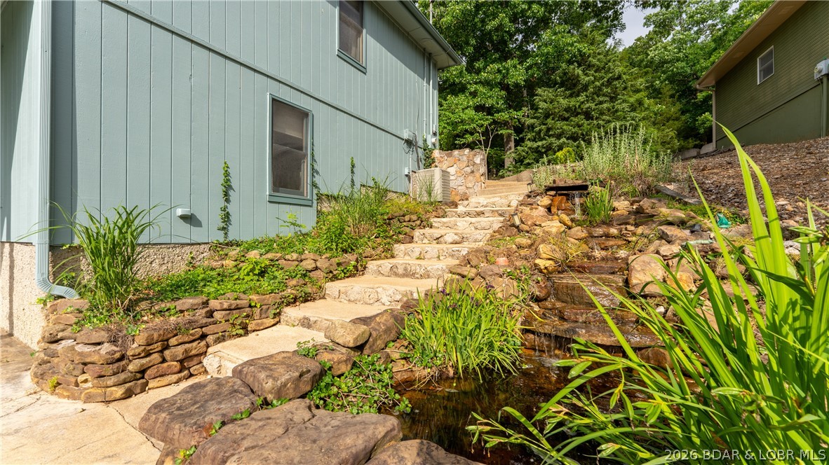 490 Waterfowl Road Linn Creek, MO 65052 - Photo 33 of 52 Custom Waterfall & easy steps from parking