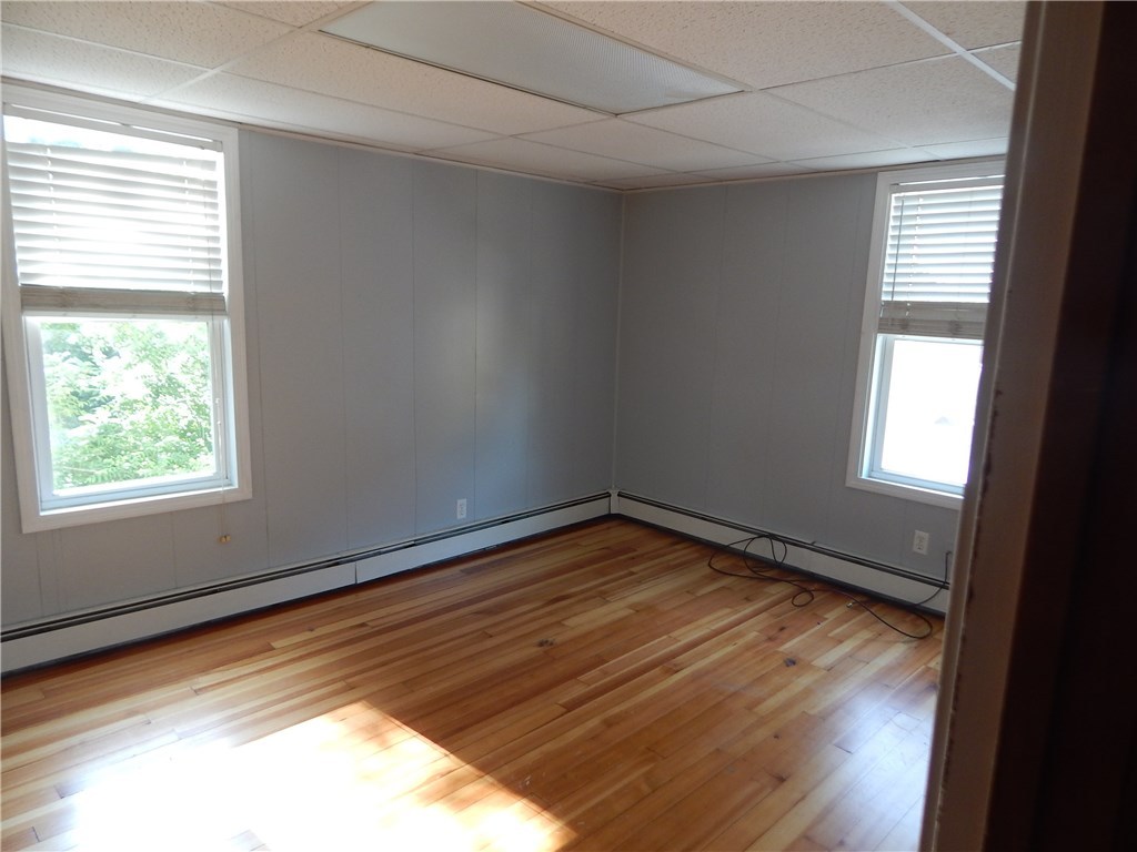 289 Ward Street Woonsocket, RI 02895 - Photo 16 of 23 First floor bedroom, hardwood floor.