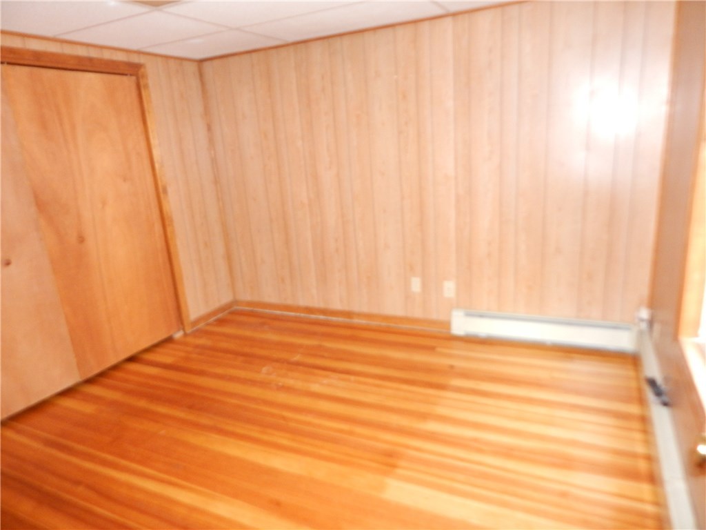 289 Ward Street Woonsocket, RI 02895 - Photo 17 of 23 First floor bedroom, hardwood floor.