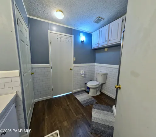a view of bathroom with toilet