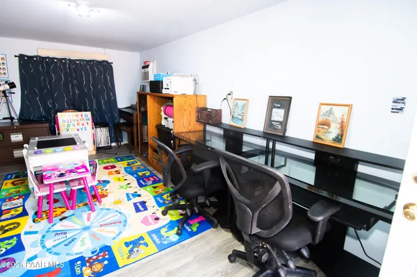 a room with toys and storage space