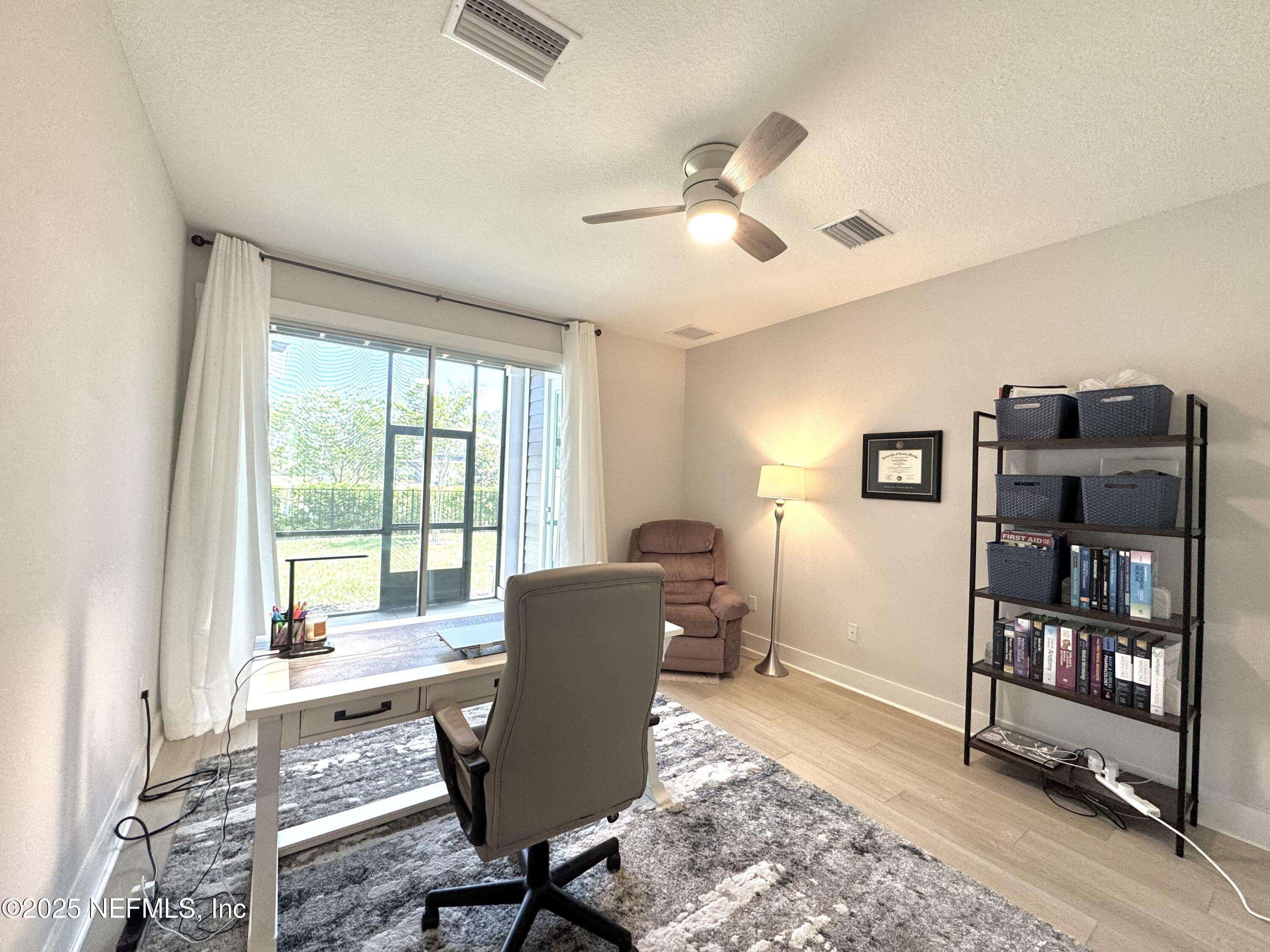 9860 Element Road Jacksonville, FL 32256 - Photo 22 of 35 Downstairs Bedroom/Office