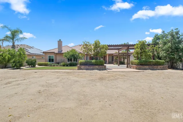 a house view with a outdoor space