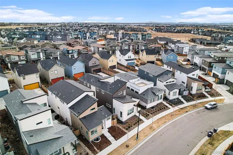 an aerial view of residential building with parking space