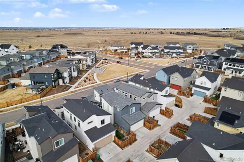 an aerial view of a ocean and city