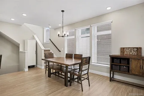 a view of a livingroom with furniture and staircase