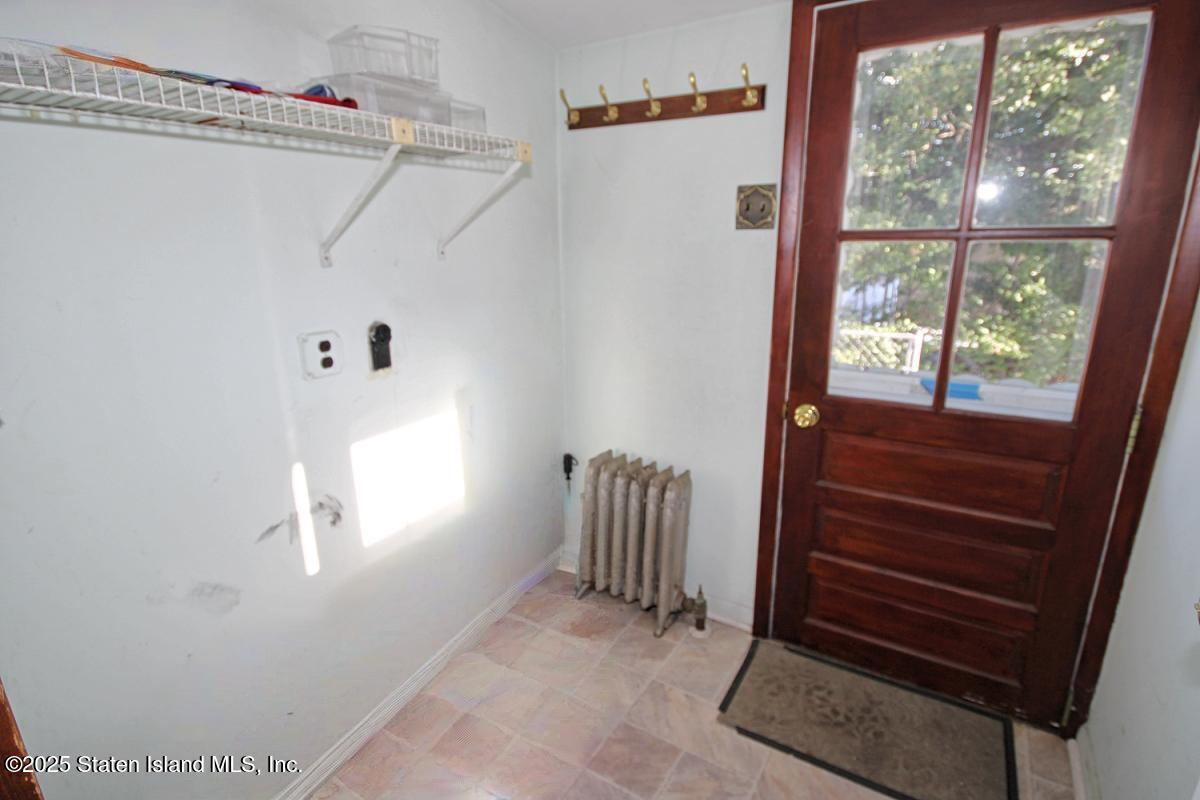 121 Joline Avenue Staten Island, NY 10307 - Photo 13 of 23 121 JOL BACK PORCH REAR DOOR