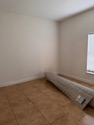 an empty room with a window