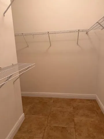 a view of small space with racks on the wall