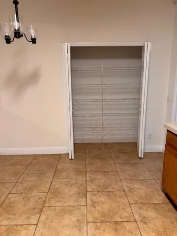 a view of room with walk in closet