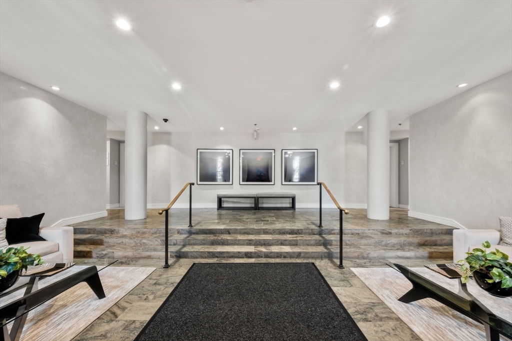 2420 Beacon Street, Unit 402 Boston, MA 02467 - Photo 2 of 29 a living room with furniture