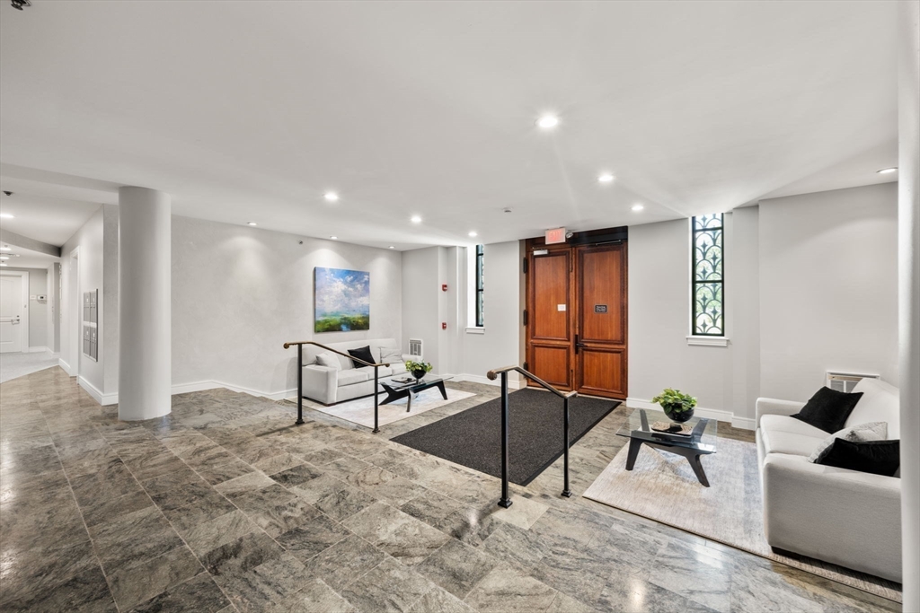 2420 Beacon Street, Unit 402 Boston, MA 02467 - Photo 3 of 29 a living room with furniture