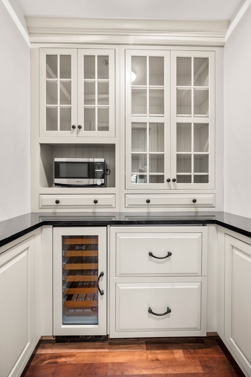 2420 Beacon Street, Unit 402 Boston, MA 02467 - Photo 6 of 29 a kitchen with a stove and a microwave