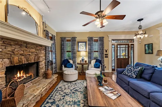 a living room with furniture and a rug