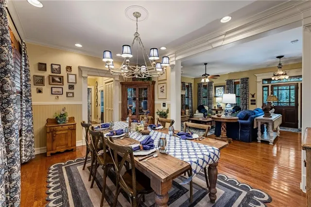 a bedroom with a bed and ceiling fan
