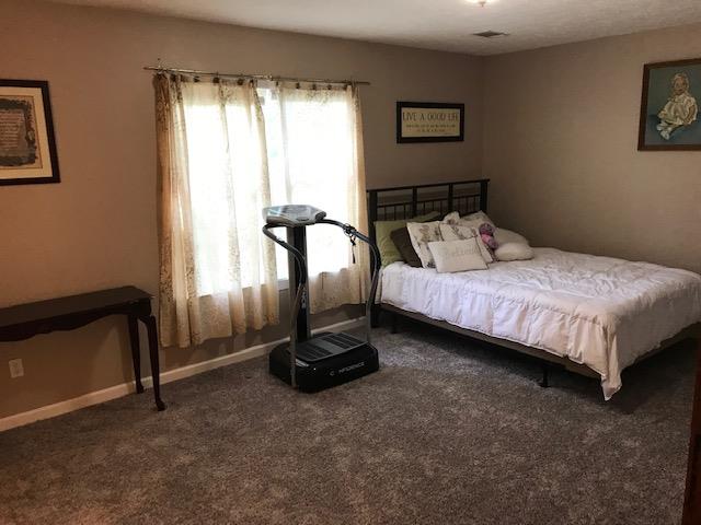 4221 Turnberry Road Lebanon, TN 37090 - Photo 13 of 22 a bedroom with a bed and a window