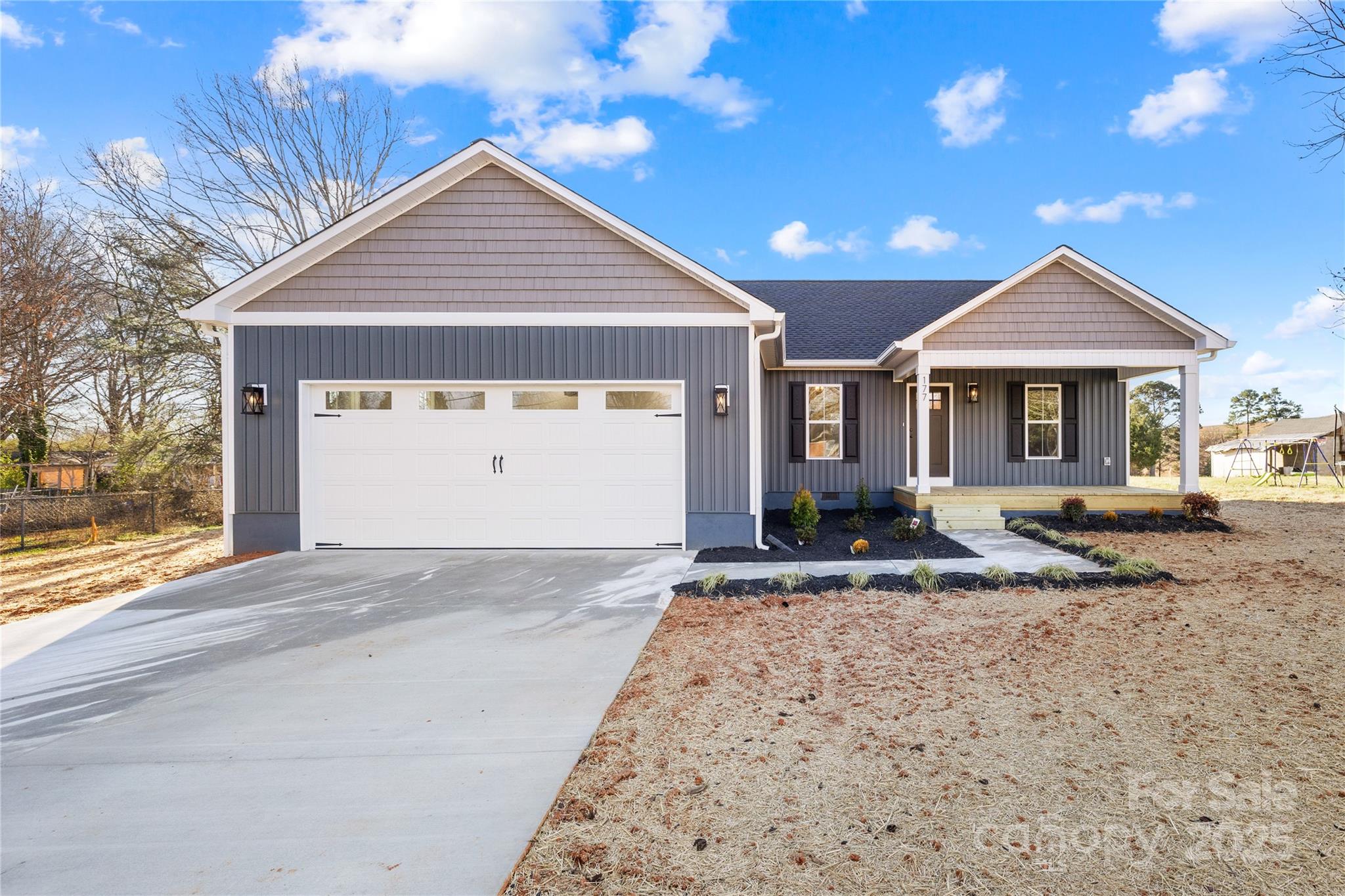 177 Monticello Road Statesville, NC 28625 - Photo 2 of 39 a front view of a house with a yard