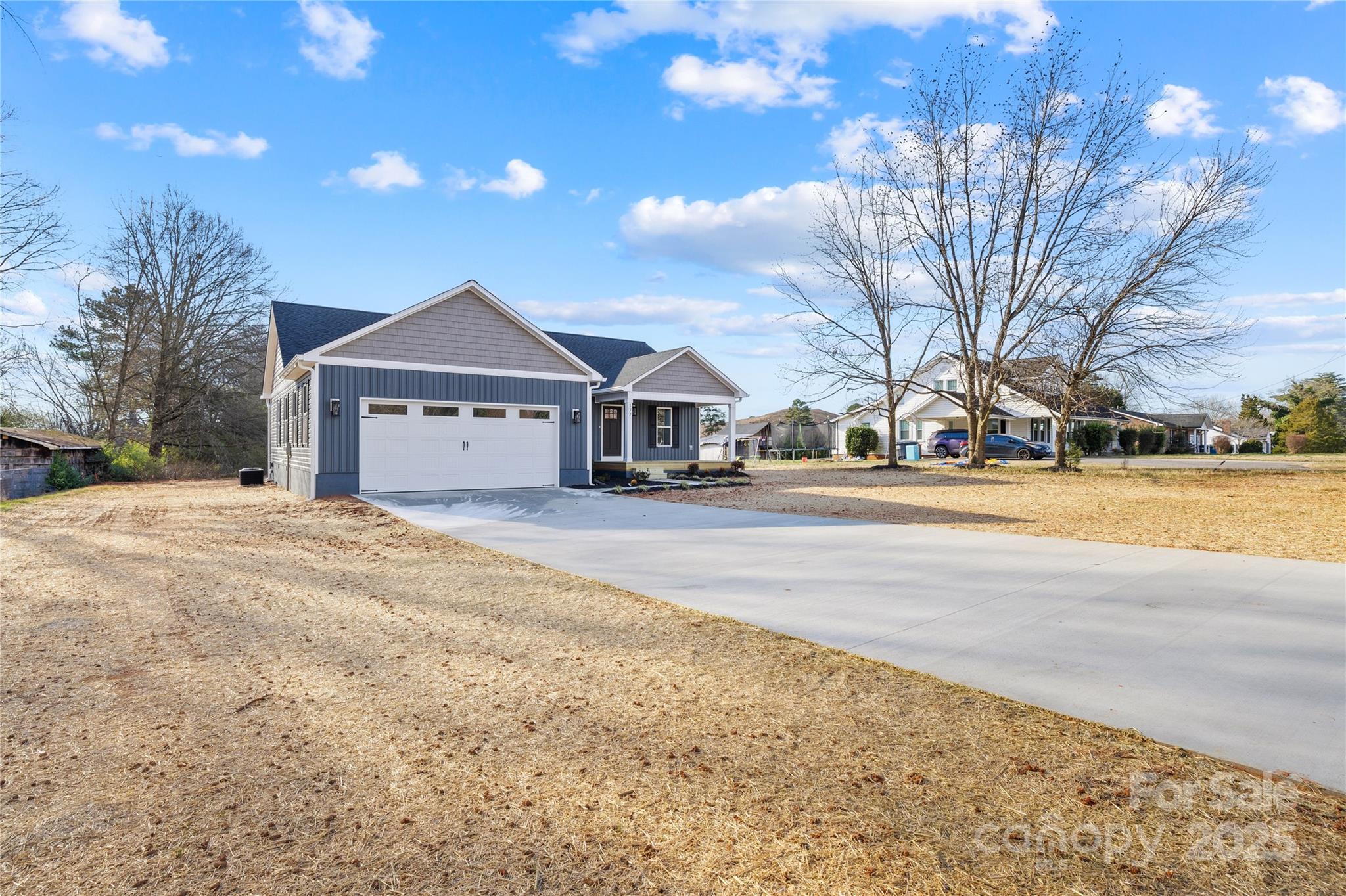 177 Monticello Road Statesville, NC 28625 - Photo 25 of 39 a view of a house with a yard