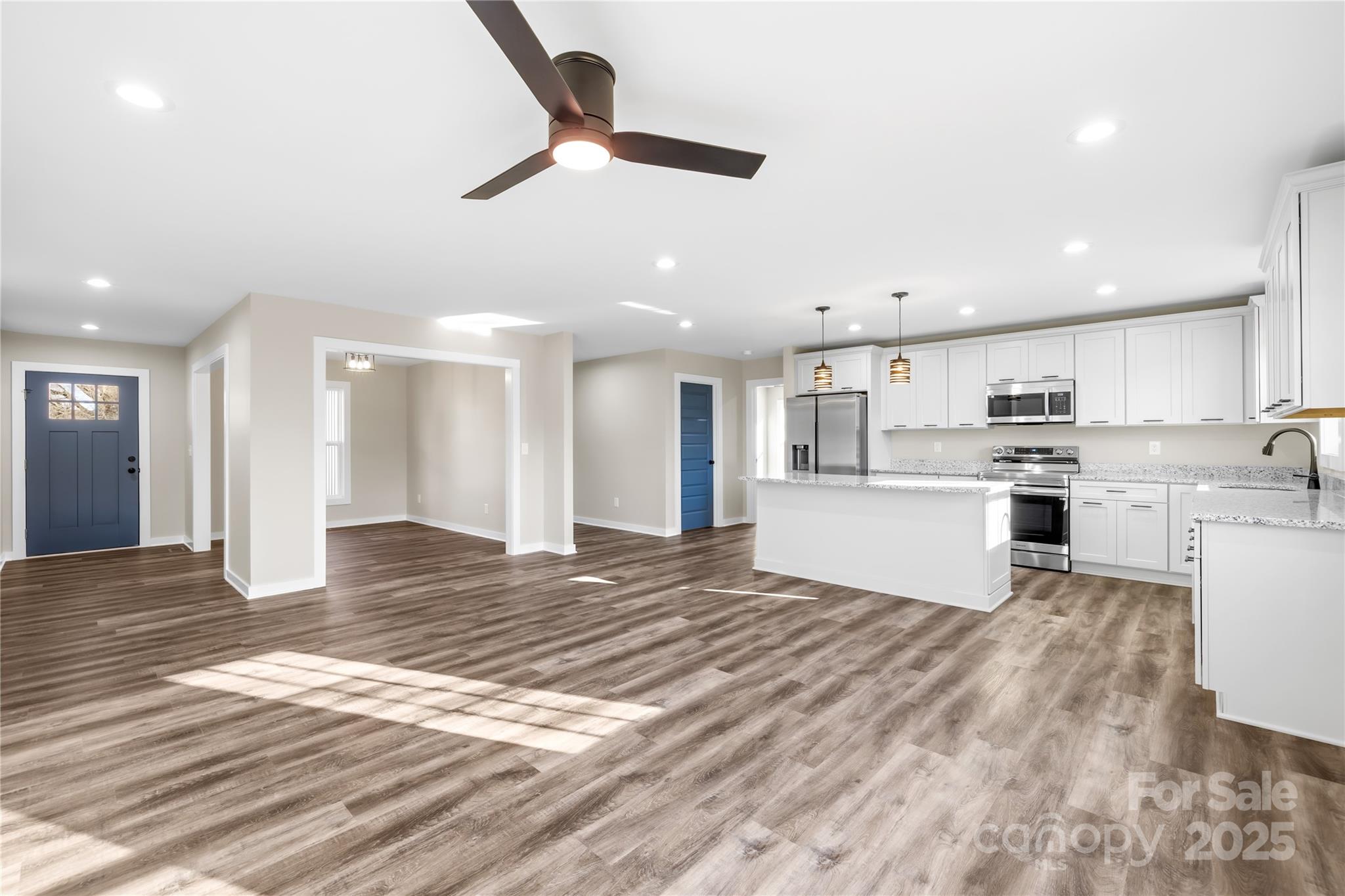 177 Monticello Road Statesville, NC 28625 - Photo 6 of 39 a view of kitchen dining table chairs microwave and cabinets