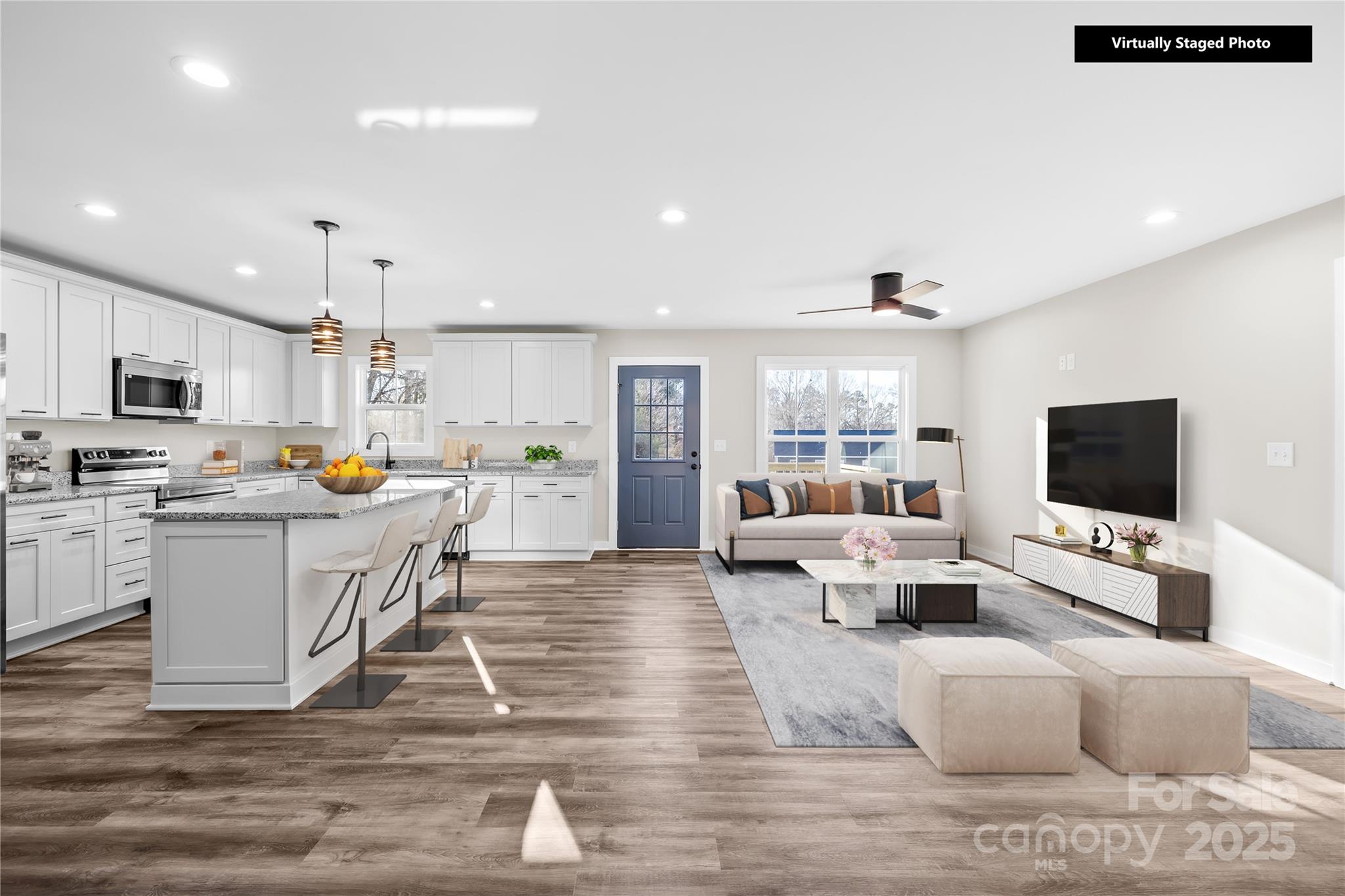 177 Monticello Road Statesville, NC 28625 - Photo 9 of 39 a living room with furniture and a flat screen tv