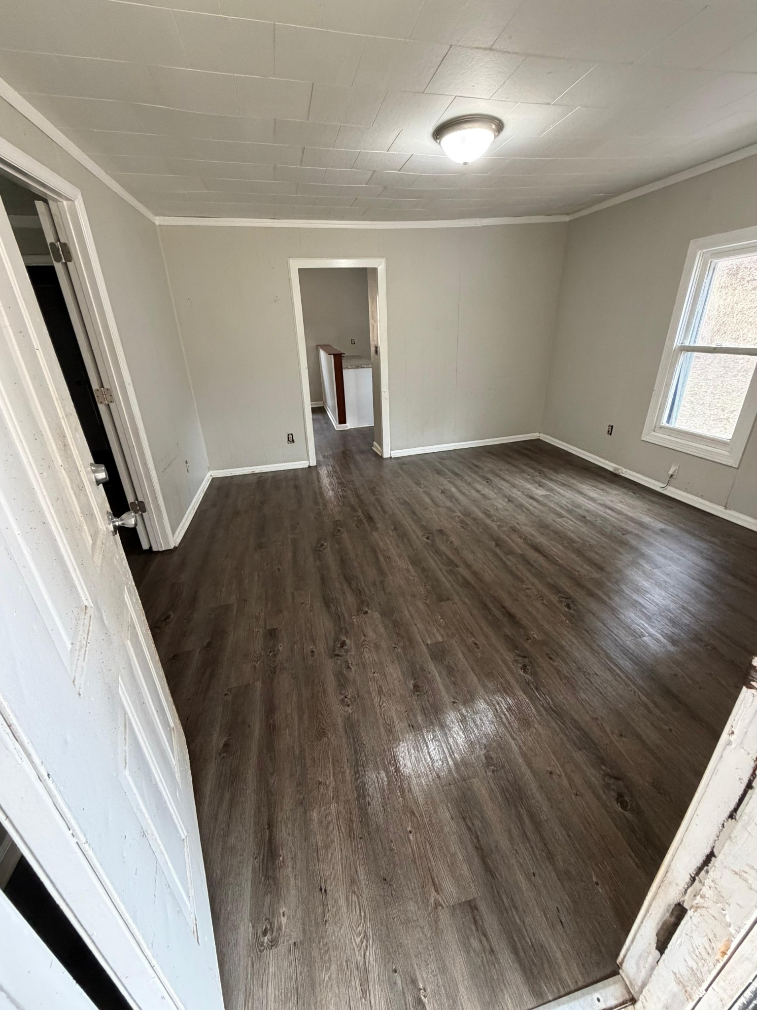 6684 Cavender Road Lyles, TN 37098 - Photo 1 of 13 wooden floor in an empty room with a window