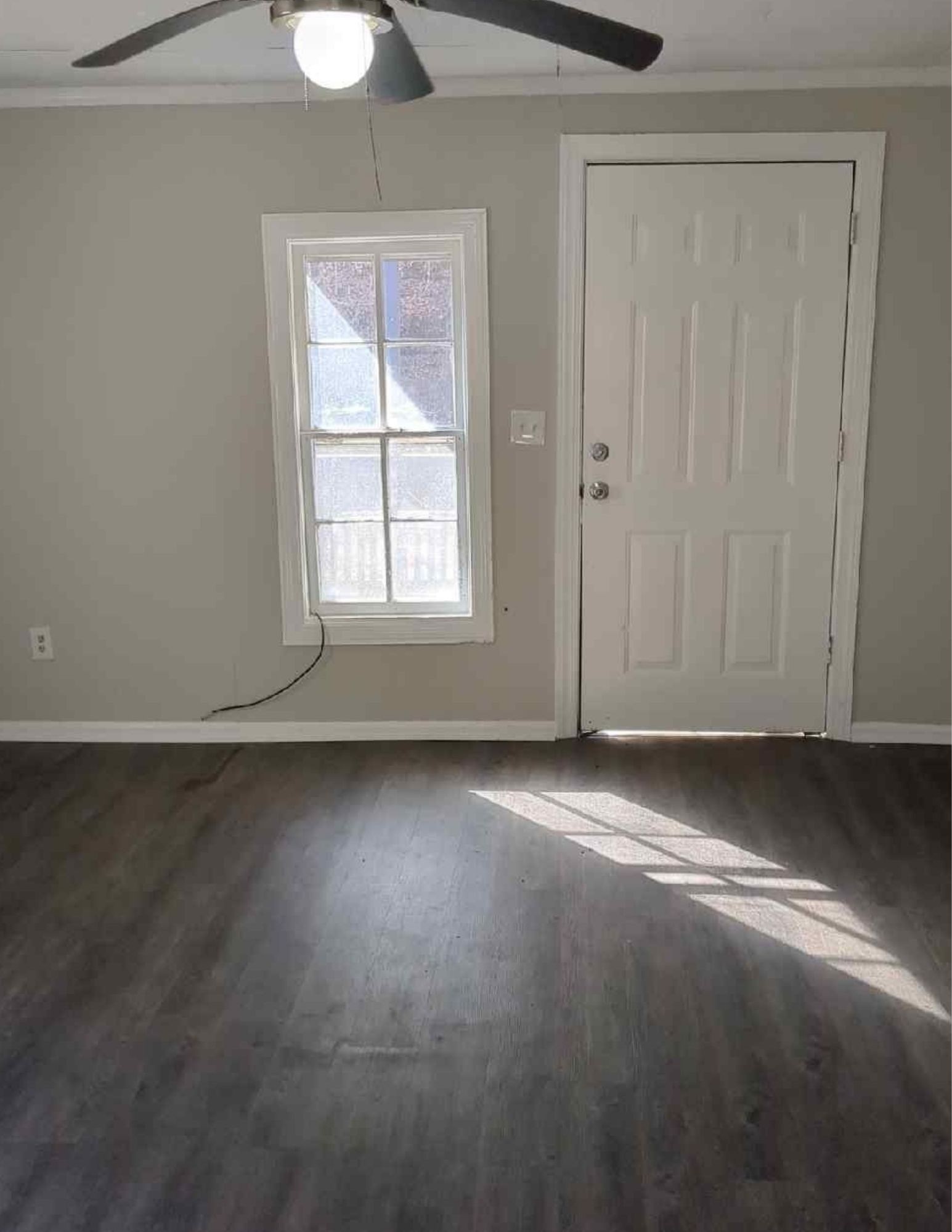 6684 Cavender Road Lyles, TN 37098 - Photo 2 of 13 an empty room with a window