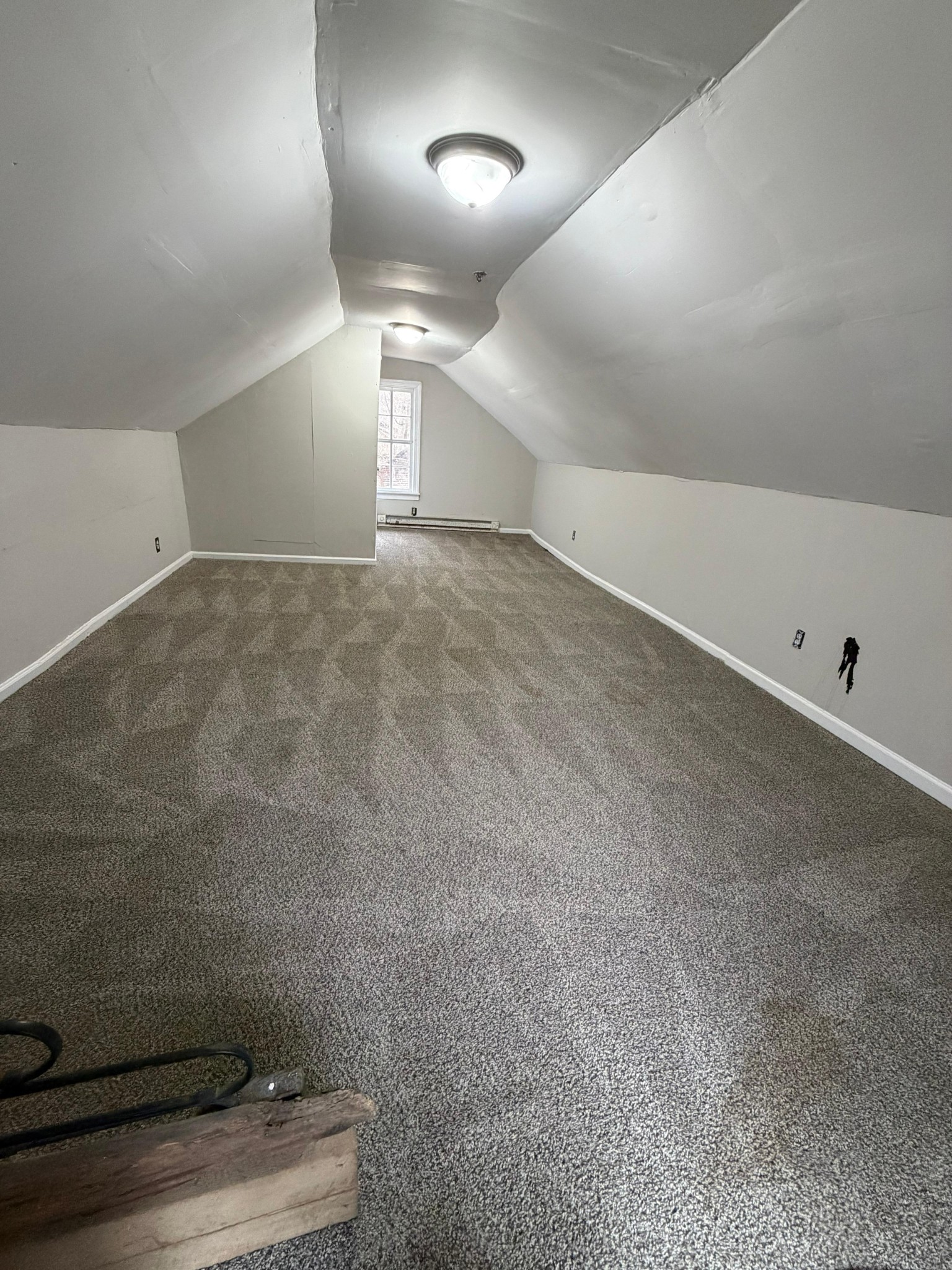 6684 Cavender Road Lyles, TN 37098 - Photo 8 of 13 an empty room with stairs and windows