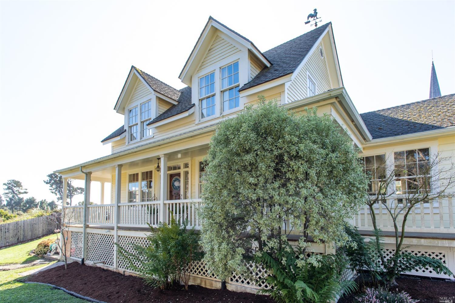 44801 Main Street Mendocino, CA 95460 - Photo 1 of 1 a front view of a house with a yard