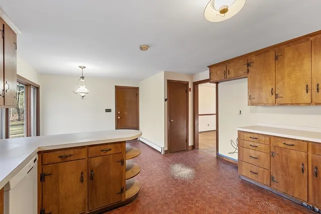 a view of empty room with windows