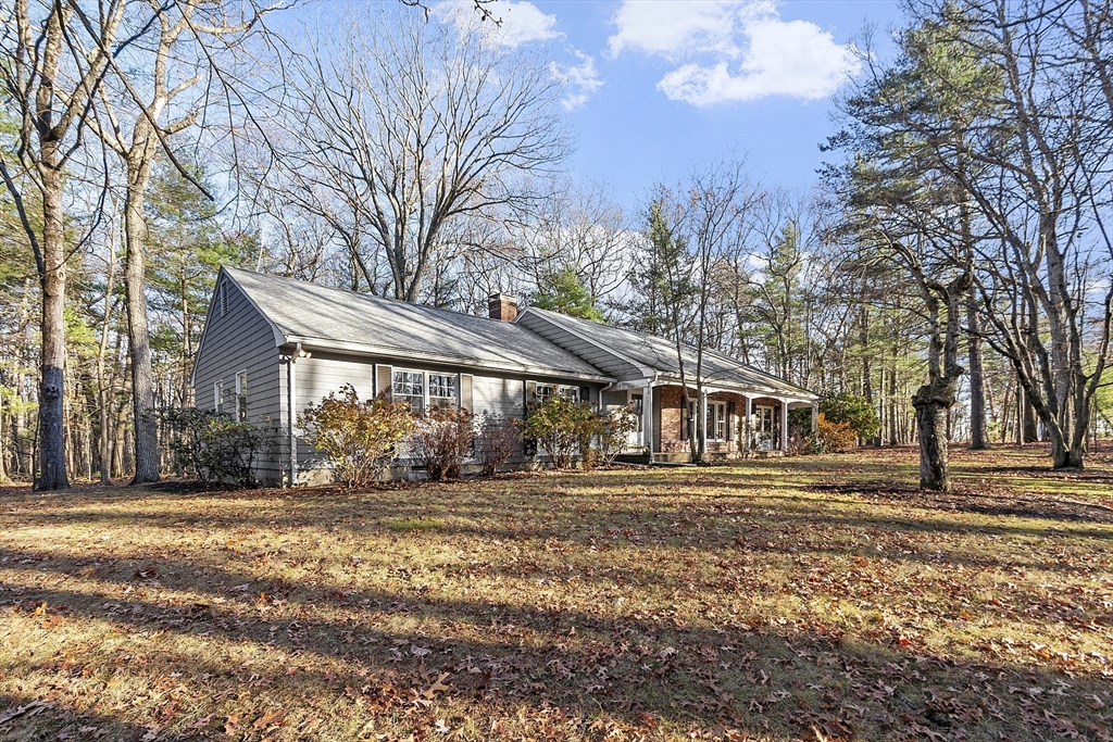 19 Partridge Hill Road Harvard, MA 01451 - Photo 2 of 42 a front view of residential houses with yard and trees
