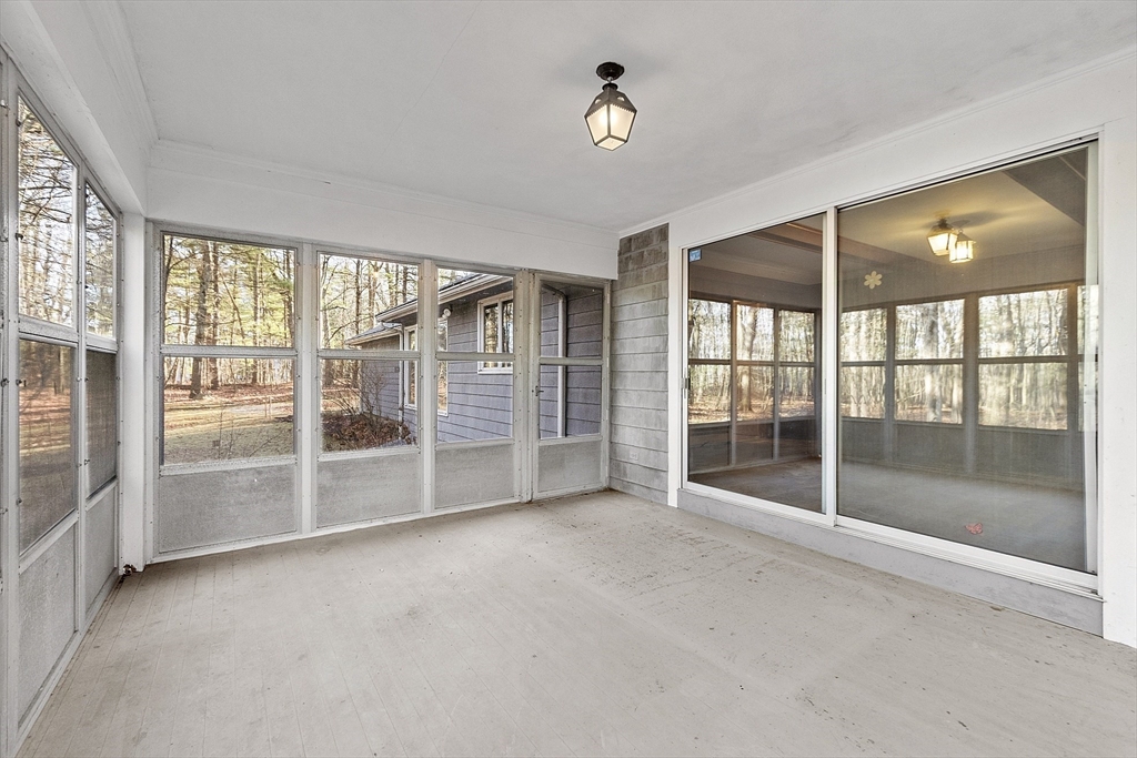 19 Partridge Hill Road Harvard, MA 01451 - Photo 25 of 42 a view of empty room with floor to ceiling window and an empty room