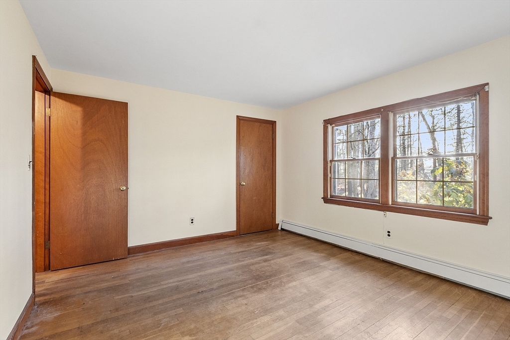 19 Partridge Hill Road Harvard, MA 01451 - Photo 28 of 42 an empty room with windows and closet