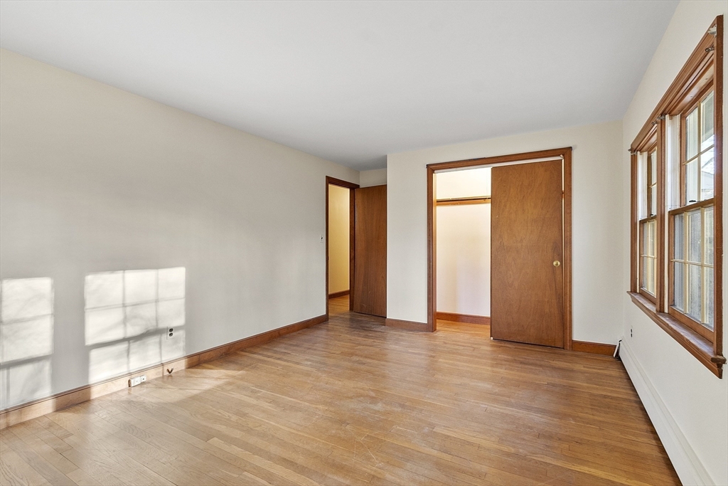 19 Partridge Hill Road Harvard, MA 01451 - Photo 33 of 42 wooden floor in an empty room with a window