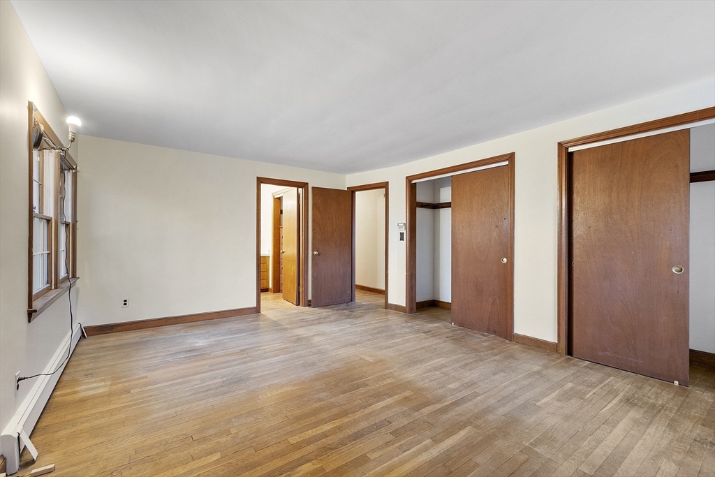19 Partridge Hill Road Harvard, MA 01451 - Photo 36 of 42 a view of an empty room with window and closet area
