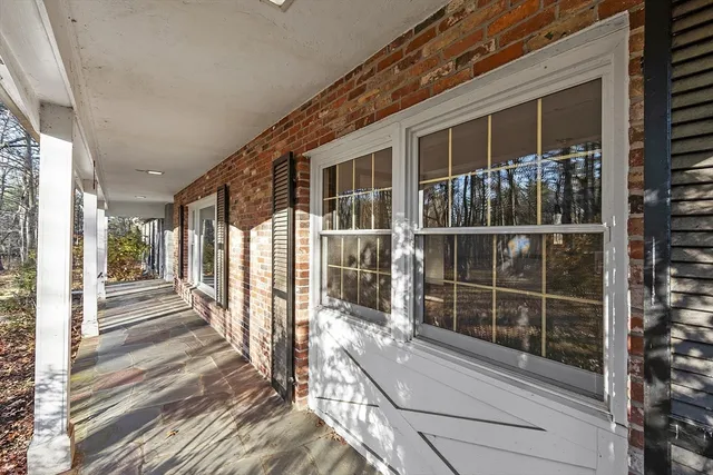 a view of a house with a large window