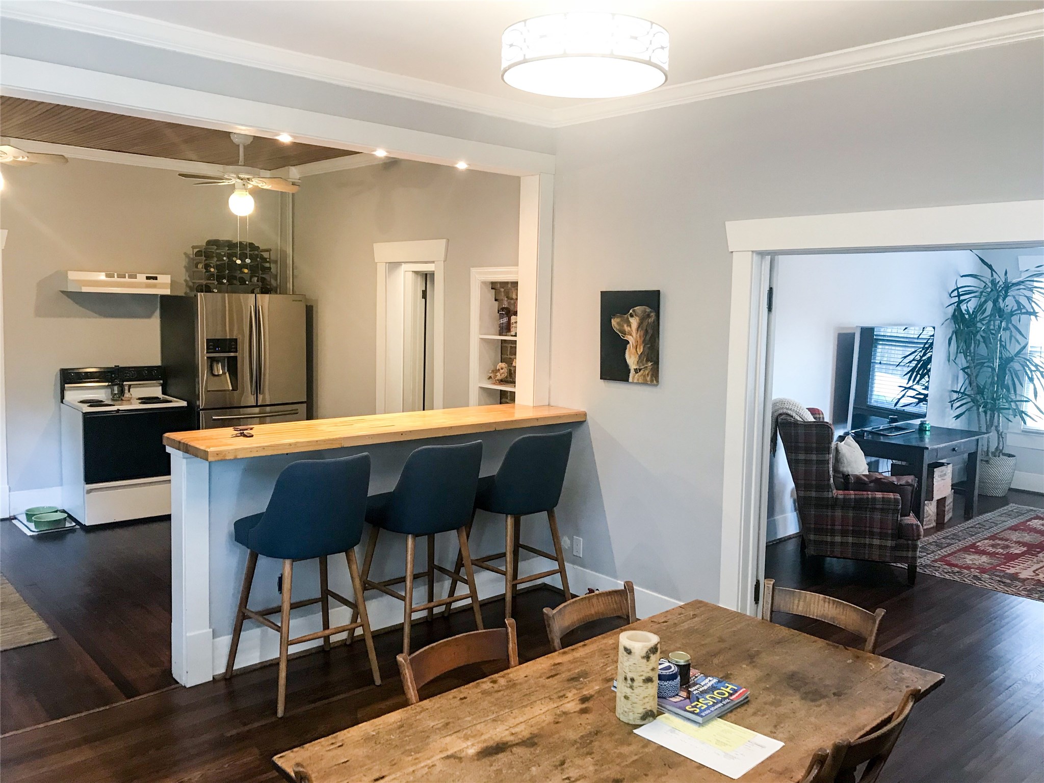 210 Tabor Street Houston, TX 77009 - Photo 7 of 20 a view of a dining room with furniture and wooden floor