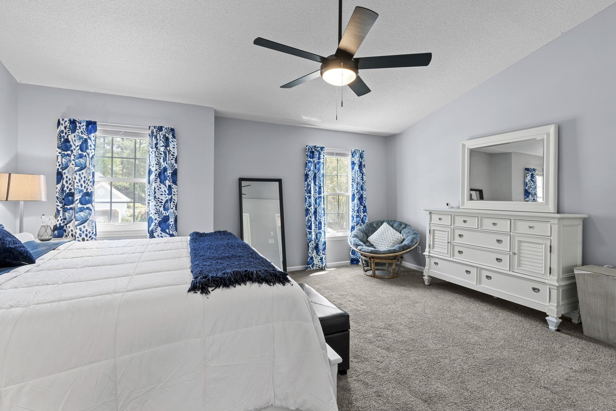 6809 Fereday Court Raleigh, NC 27616 - Photo 12 of 21 a bedroom with a bed and a dresser