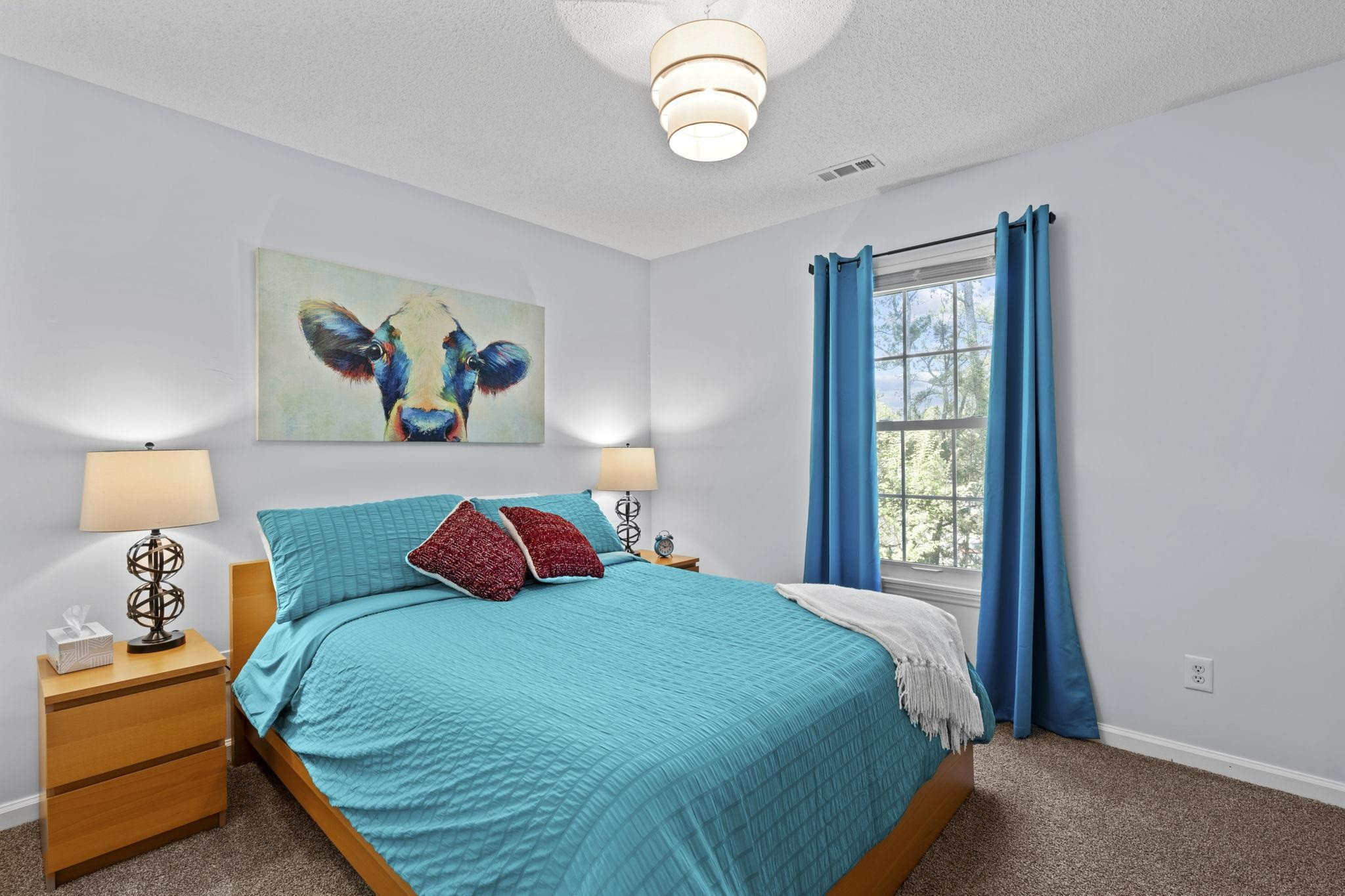 6809 Fereday Court Raleigh, NC 27616 - Photo 15 of 21 a bedroom with a bed and a window
