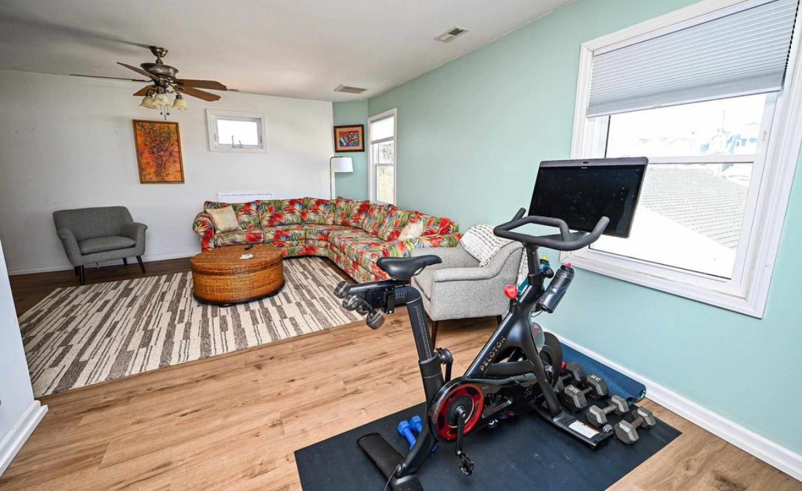 214 Sunray Road Del Haven, NJ 08251 - Photo 14 of 23 a bedroom with a bed and a desk