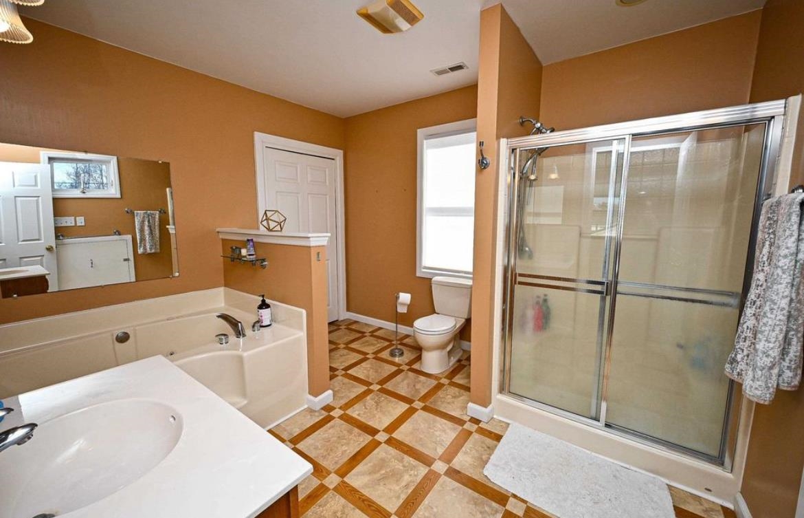214 Sunray Road Del Haven, NJ 08251 - Photo 15 of 23 a bathroom with a tub sink shower and mirror